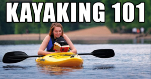 girl reading on kayak